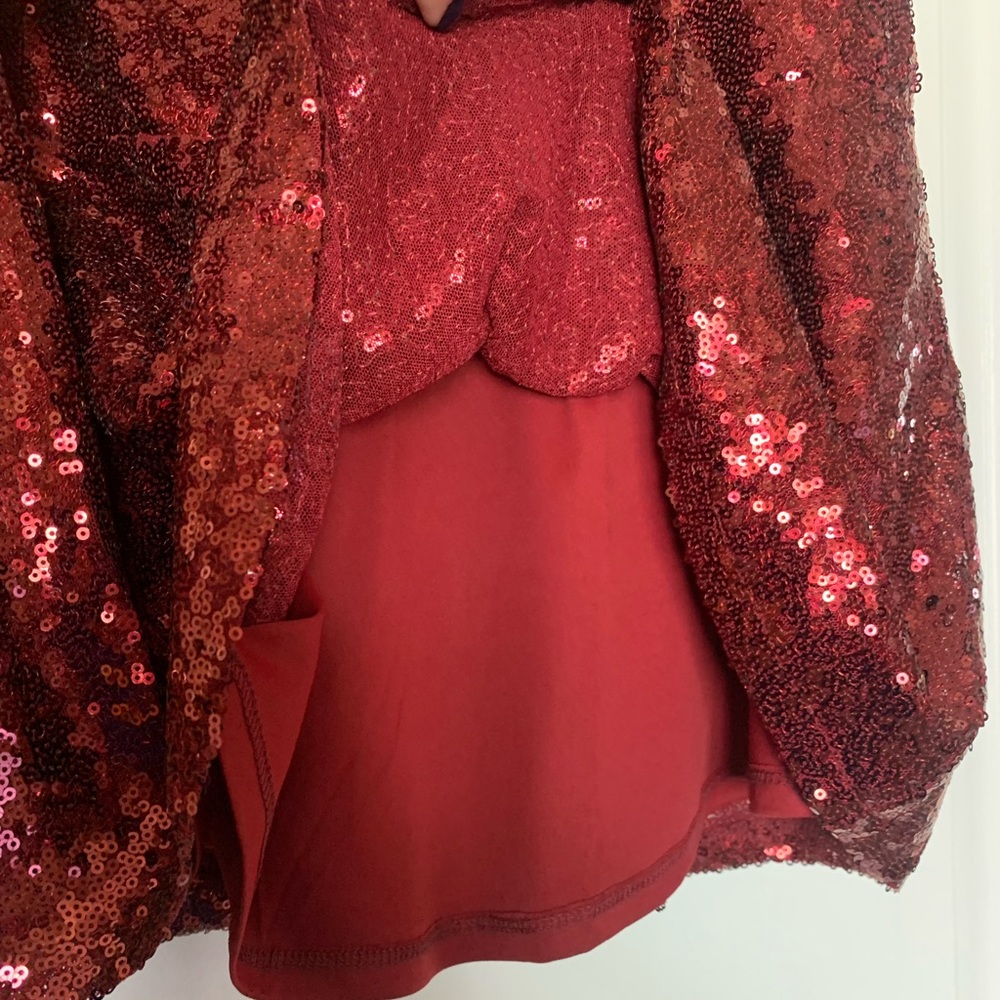 Sequin Flutter Sleeve Peplum Top - Picture 4 of 9